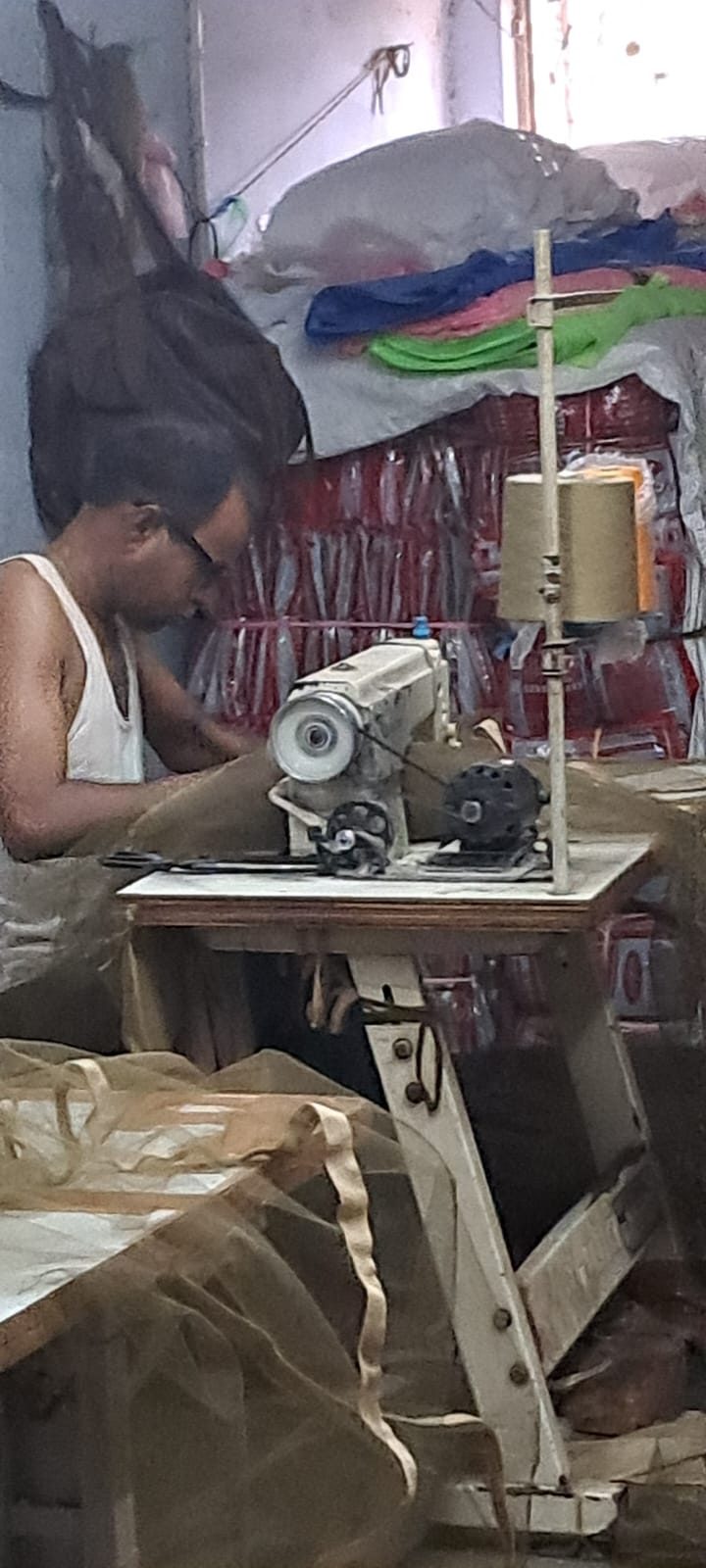 Mosquito net production inspection at Nirmal Textiles factory