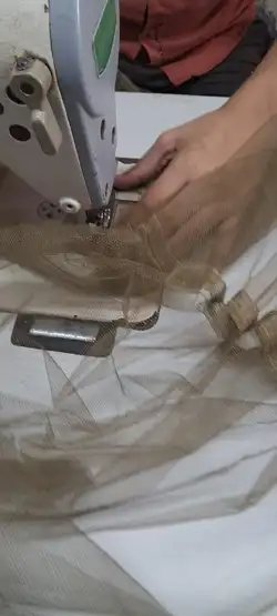 Mosquito net stitching close-up — factory quality