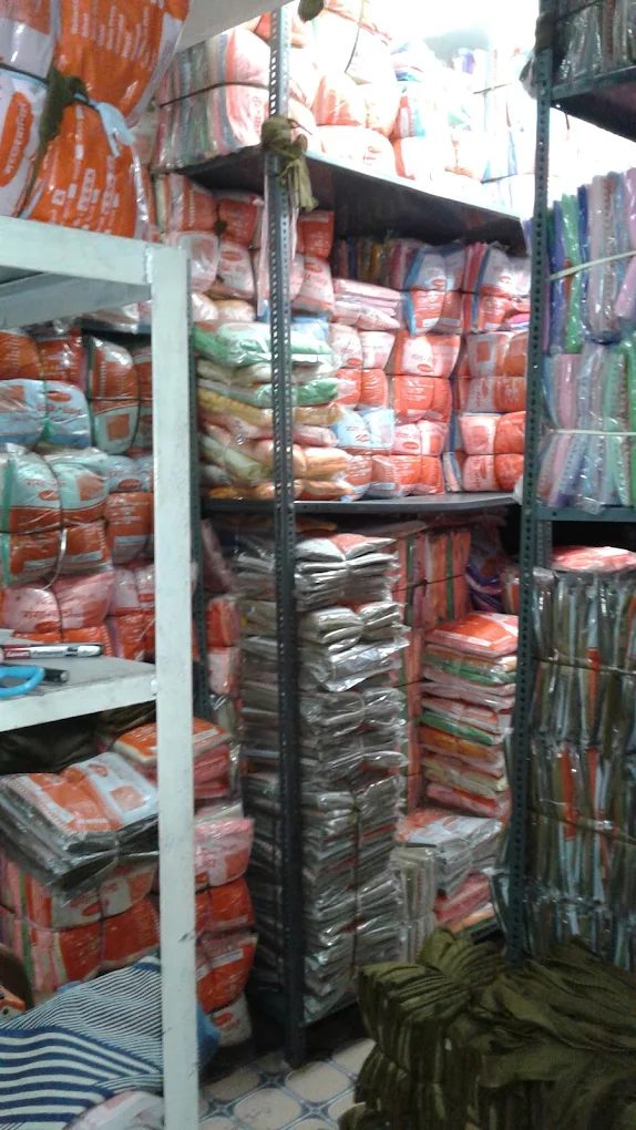 Nirmal Textiles warehouse — bulk stock ready for dispatch